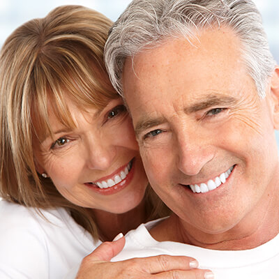 Older couple smiling together