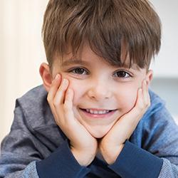 Little boy smiling with healthy teeth