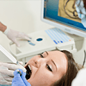 Patient receiving intraoral scans