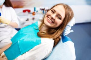 Woman smiling after her routine checkup